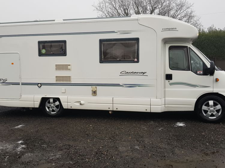 now sold thanks!!!!!!motorhome compass castaway fixed bed 4 berth rear garage plus safari room and towbar 2004 px poss