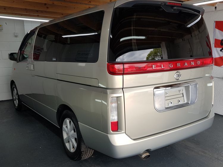 now sold thanks!!!!!!issan Elgrand 3.5 automatic 8 seater biege MPV day van only 40k miles 2004	in stock rear electric curtains -quote 119