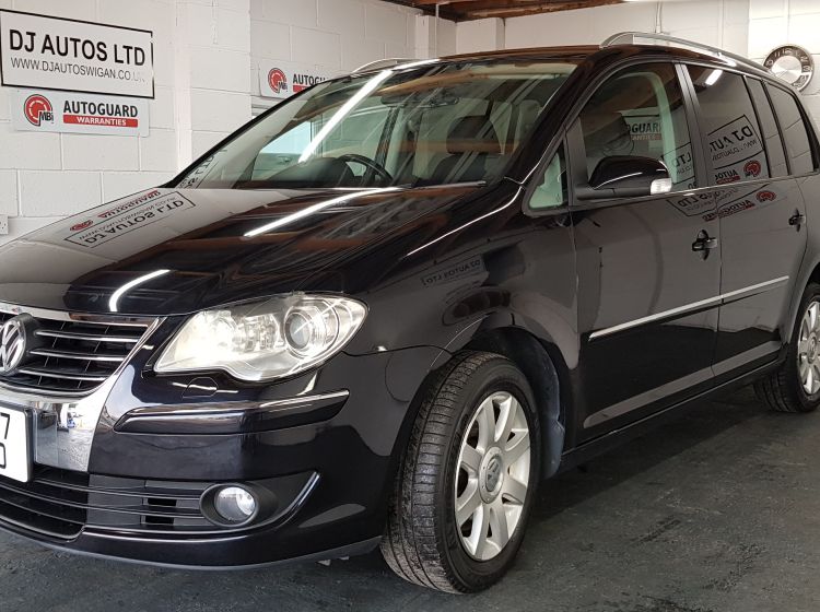 now sold thanks!!!!!!Volkswagen Touran 1.4 TSI auto 7 seater black japanese import excellent condition px and finance 2x cameras fitted