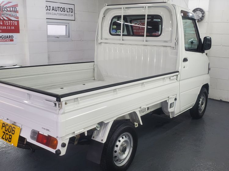 sold deposit recieved!!!!!!!!!317-Mitsubishi minicab pickup 4wd fresh japanese import only 3k miles 06 -no rust or corrosion-please quote 317
